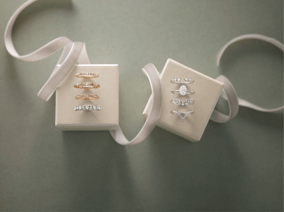 Elegant diamond rings in gift boxes with ribbons, perfect for engagement or special occasions