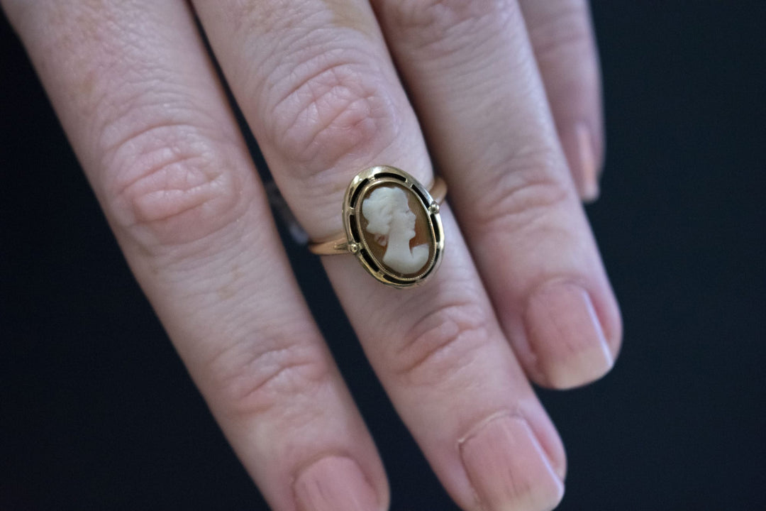 Vintage gold cameo ring with profile carving, elegant estate jewelry piece