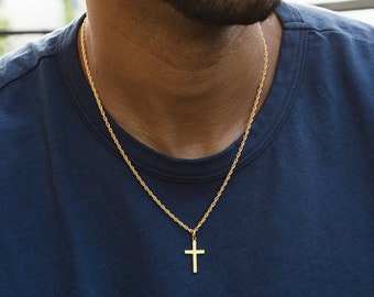 Gold cross necklace on man, ideal for men's jewelry and faith-inspired styles in Charlotte, NC