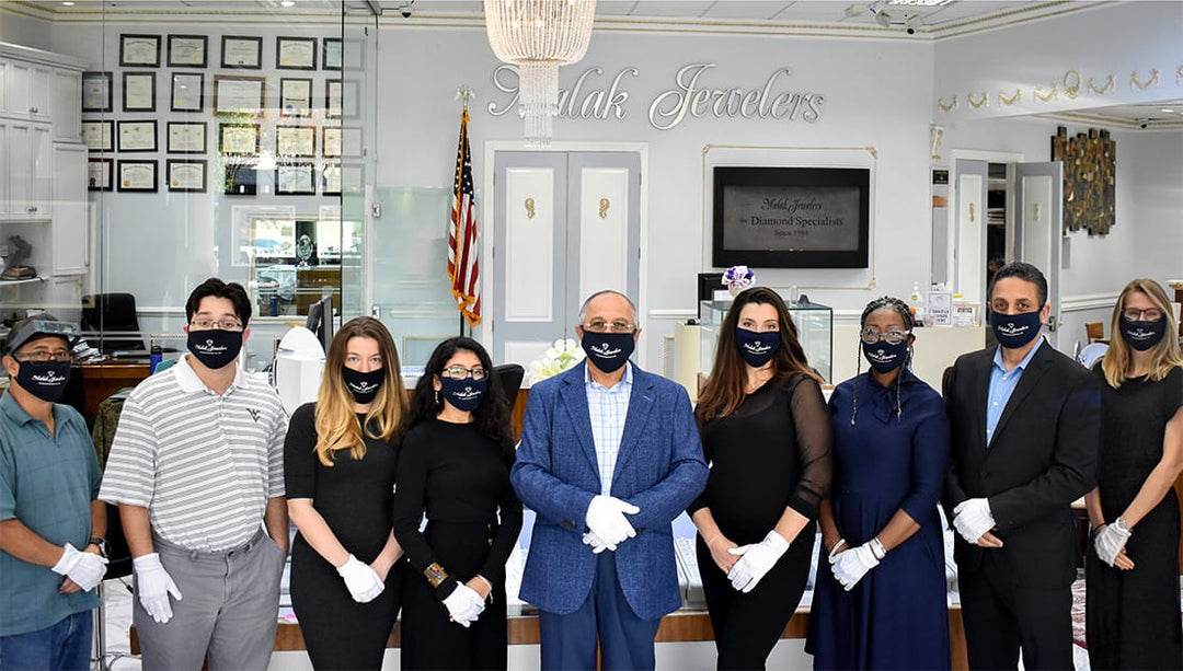 Malak Jewelers team in luxury jewelry store, Charlotte NC, specializing in engagement rings and estate jewelry