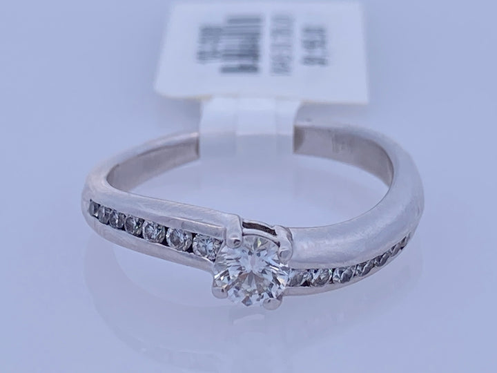 Platinum Round Diamond 0.20Ct Contemporary Engagement Ring