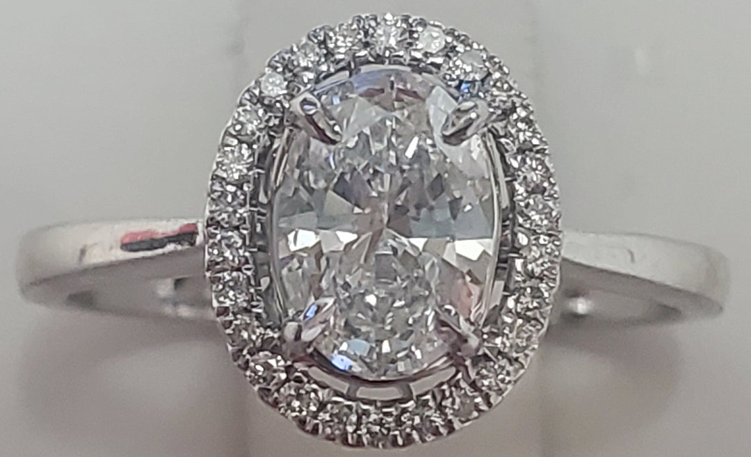 18K White Gold 0.72ct Oval Diamond Halo Engagement Ring